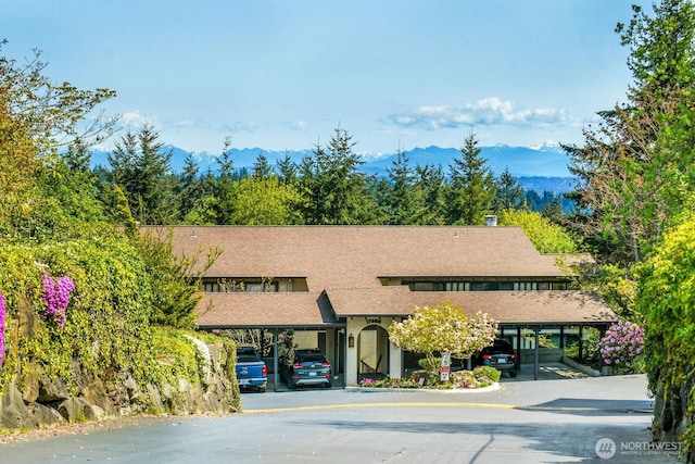 exterior space featuring a mountain view