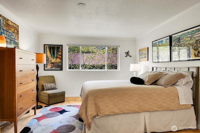 bedroom featuring a textured ceiling, wood finished floors, and ornamental molding
