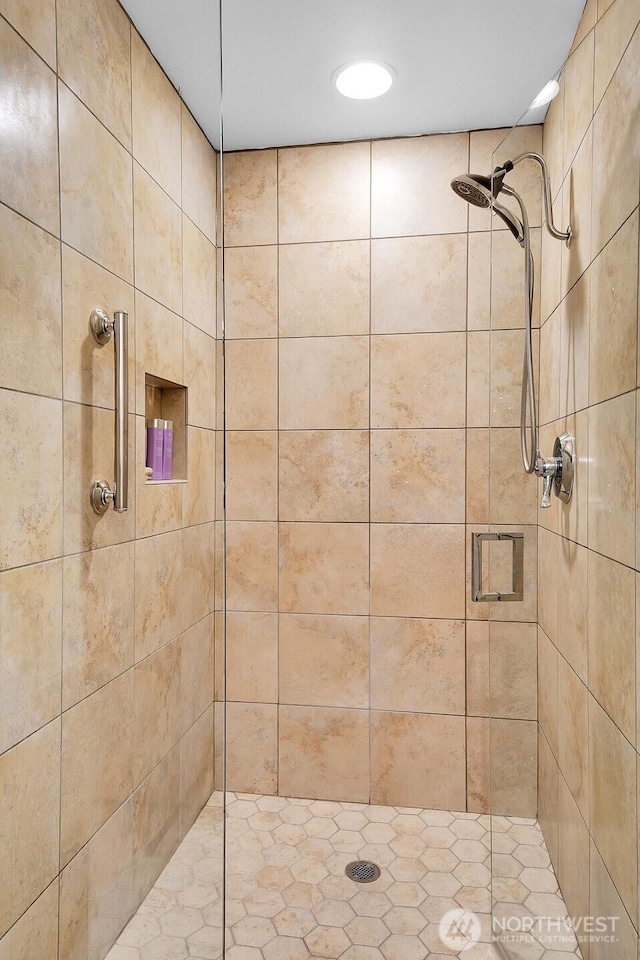 full bathroom featuring a stall shower and recessed lighting