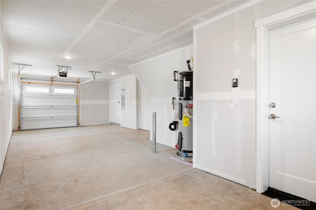 garage with hybrid water heater and a garage door opener