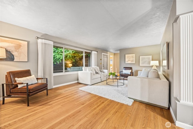 17922 Marine View Dr SW, Normandy Park, WA 98166 - living area featuring baseboards and light wood-style floors