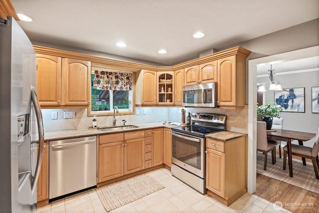 17922 Marine View Dr SW, Normandy Park, WA 98166 - kitchen with a sink, tasteful backsplash, recessed lighting, light stone countertops, and appliances with stainless steel finishes