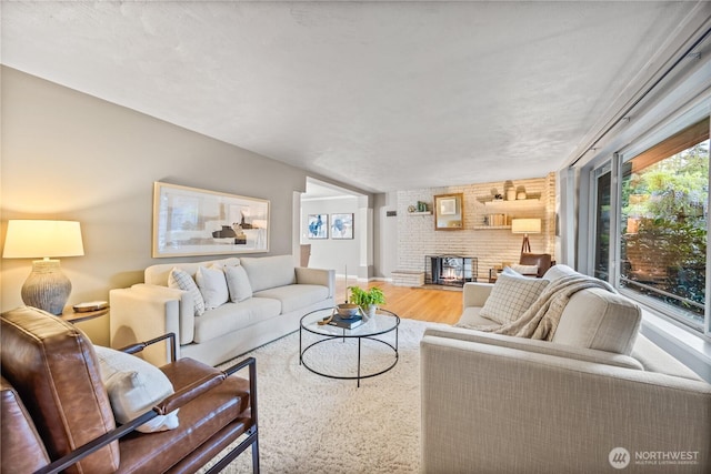 17922 Marine View Dr SW, Normandy Park, WA 98166 - living area with wood finished floors and a fireplace