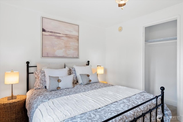 carpeted bedroom with a closet