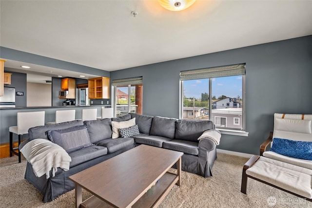8075 Harborview Rd Unit 301, Blaine, WA 98230 - living room featuring light carpet, baseboards, and recessed lighting