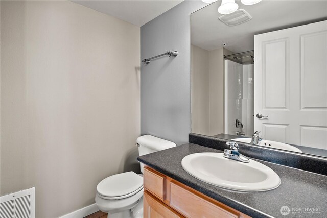 8075 Harborview Rd Unit 301, Blaine, WA 98230 - full bathroom with toilet, a shower, and vanity