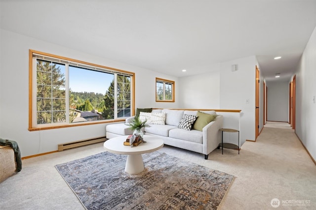 3785 Greenville Pl, Bellingham, WA 98226 - carpeted living room with a baseboard radiator, baseboards, and recessed lighting