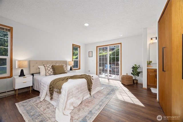 3785 Greenville Pl, Bellingham, WA 98226 - bedroom with a textured ceiling, access to exterior, recessed lighting, and dark wood-style floors
