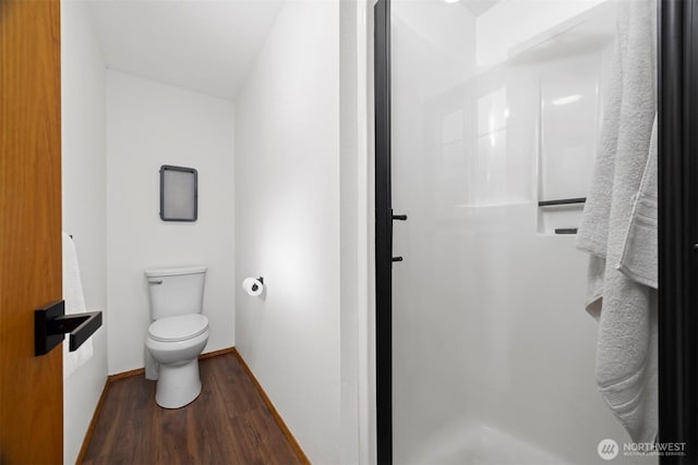 3785 Greenville Pl, Bellingham, WA 98226 - full bath with wood finished floors, a stall shower, toilet, and baseboards