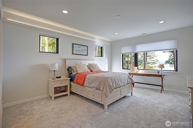 bedroom featuring recessed lighting and light colored carpet