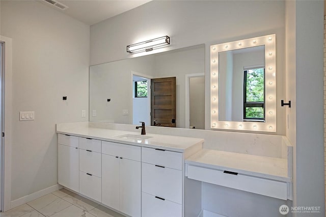 1699 SE Camano Dr, Camano Island, WA 98282 - bathroom with vanity and marble look tiles