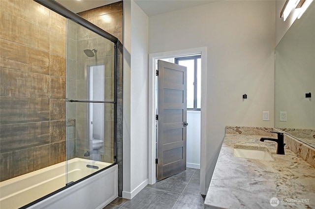 1699 SE Camano Dr, Camano Island, WA 98282 - bathroom with double vanity and bath / shower combo with glass door