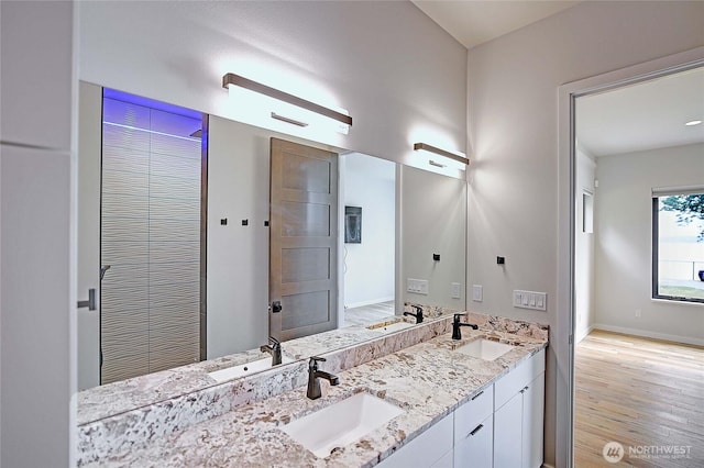 1699 SE Camano Dr, Camano Island, WA 98282 - full bath featuring double vanity and wood finished floors