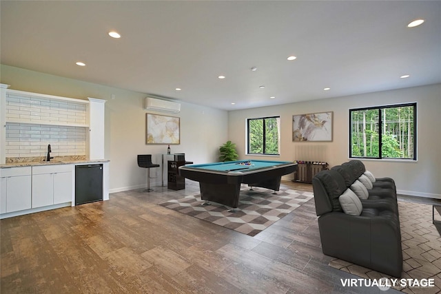 1699 SE Camano Dr, Camano Island, WA 98282 - recreation room with billiards, wood finished floors, radiator, an AC wall unit, and recessed lighting