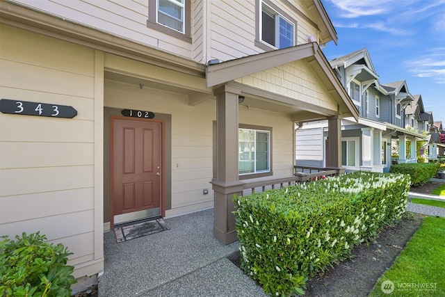 343 Tremont Ave Unit 102, Bellingham, WA 98226 - doorway to property featuring a porch and a residential view