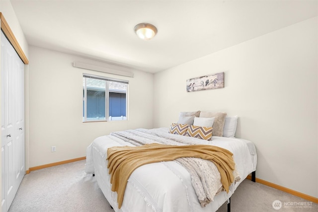 343 Tremont Ave Unit 102, Bellingham, WA 98226 - carpeted bedroom featuring baseboards and a closet