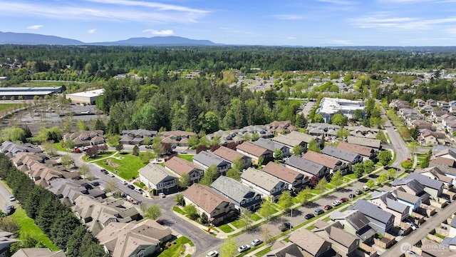 343 Tremont Ave Unit 102, Bellingham, WA 98226 - bird's eye view featuring a mountain view, a wooded view, and a residential view