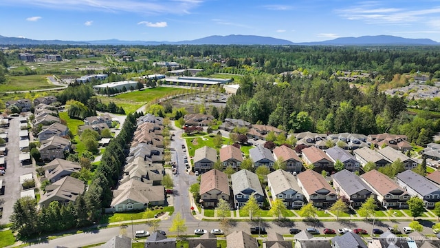 343 Tremont Ave Unit 102, Bellingham, WA 98226 - aerial view with a forest view, a residential view, and a mountain view