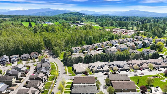 343 Tremont Ave Unit 102, Bellingham, WA 98226 - birds eye view of property featuring a view of trees, a mountain view, and a residential view