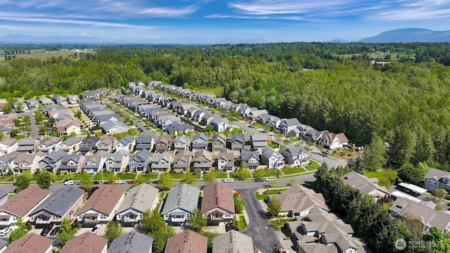 343 Tremont Ave Unit 102, Bellingham, WA 98226 - bird's eye view featuring a mountain view, a wooded view, and a residential view