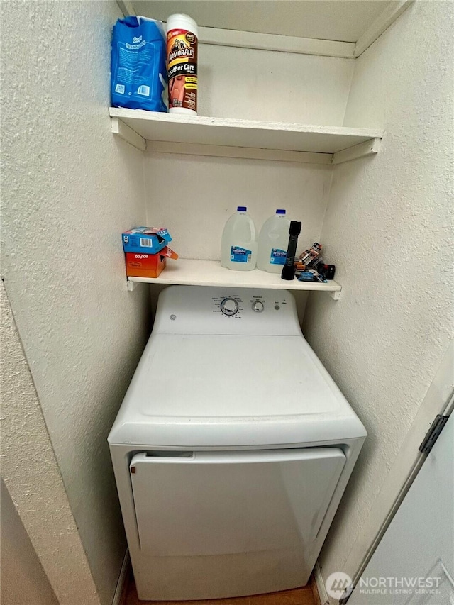 laundry room featuring washer / dryer