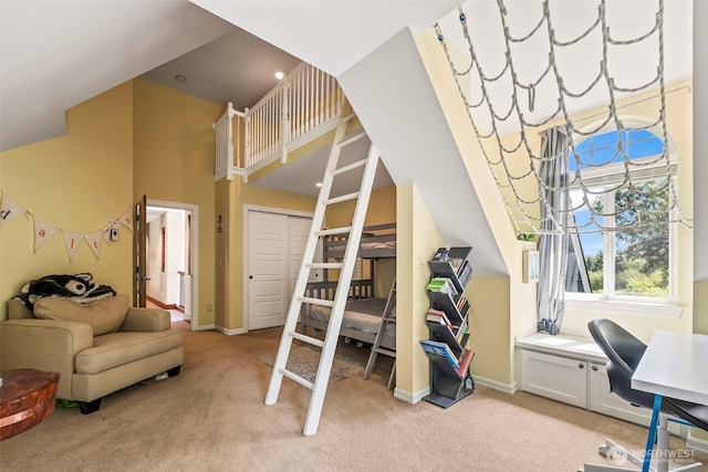 14028 104th Street Ct E, Puyallup, WA 98374 - bedroom with light colored carpet, baseboards, a high ceiling, and a closet