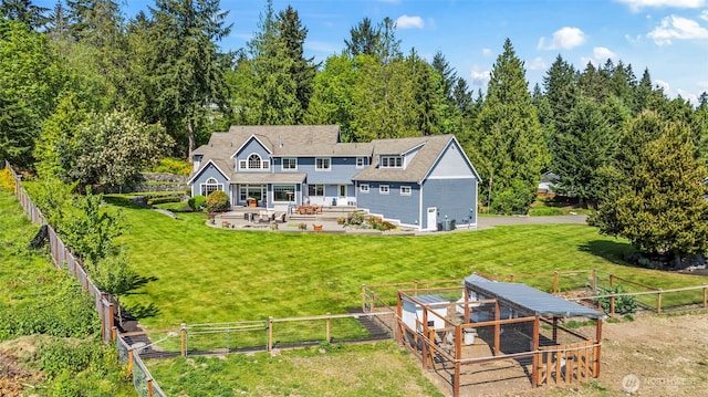 14028 104th Street Ct E, Puyallup, WA 98374 - back of house with a patio, an outbuilding, and exterior structure