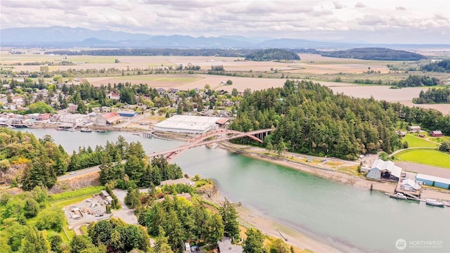 drone / aerial view of a water and mountain view