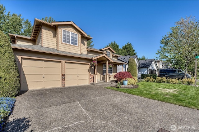 view of front facade featuring a garage, asphalt driveway, a front lawn, and brick siding