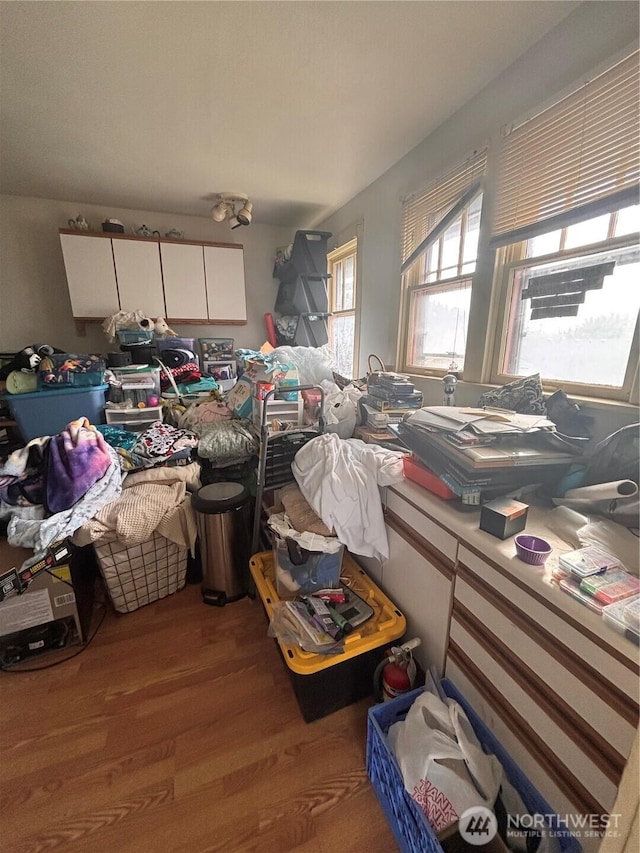 miscellaneous room featuring wood finished floors