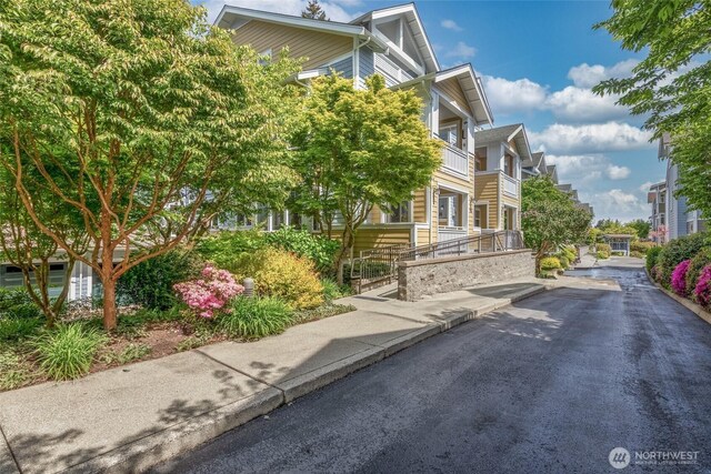 view of road with a residential view