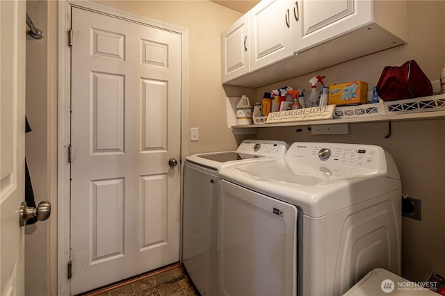 557 N Montclair Ave N, East Wenatchee, WA 98802 - laundry room with stone finish floor, independent washer and dryer, and cabinet space