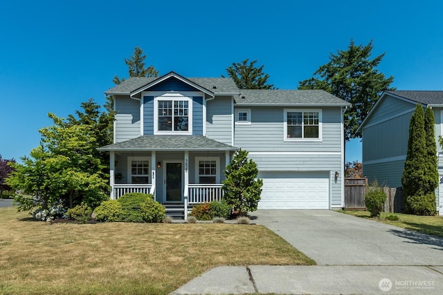3828 Sutton Pl, Anacortes, WA 98221 - traditional-style home featuring covered porch, concrete driveway, a garage, and a shingled roof