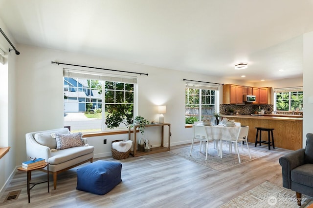 3828 Sutton Pl, Anacortes, WA 98221 - living room with light wood finished floors and baseboards