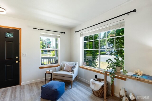 3828 Sutton Pl, Anacortes, WA 98221 - sitting room with wood finished floors and baseboards