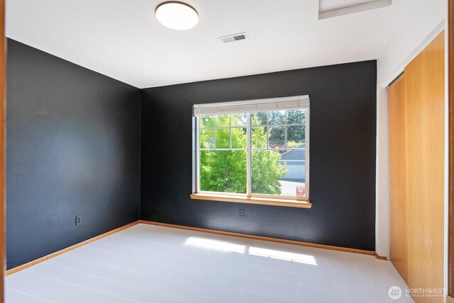3828 Sutton Pl, Anacortes, WA 98221 - carpeted empty room with baseboards