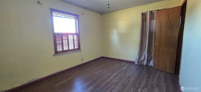 234 SW 15th Ave, Ephrata, WA 98823 - spare room with dark wood finished floors and baseboards