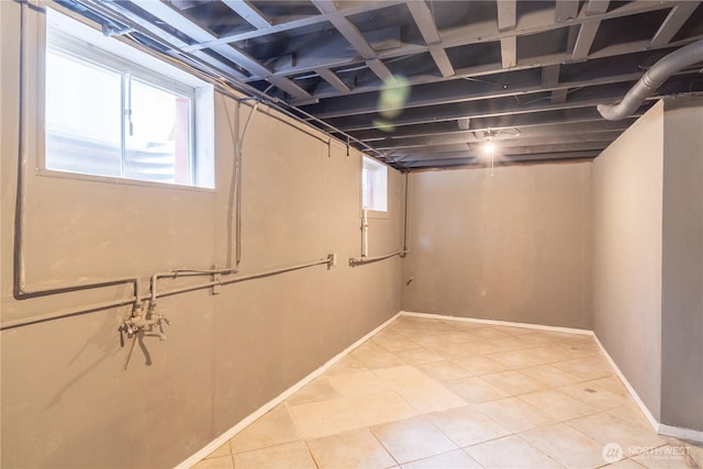 234 SW 15th Ave, Ephrata, WA 98823 - basement with healthy amount of natural light, light tile patterned floors, and baseboards