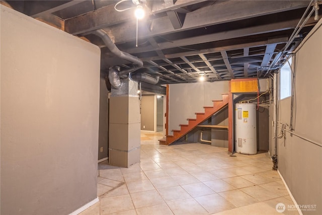 234 SW 15th Ave, Ephrata, WA 98823 - basement featuring water heater, stairway, heating unit, and light tile patterned flooring