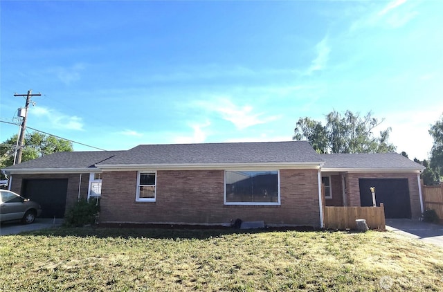 234 SW 15th Ave, Ephrata, WA 98823 - single story home featuring an attached garage, brick siding, and concrete driveway