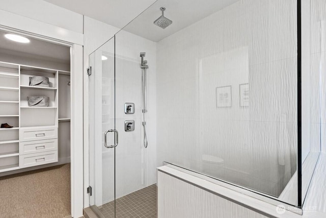 19507 81st Pl NE Unit 3, Kenmore, WA 98028 - full bath with a stall shower, a walk in closet, and tile patterned flooring