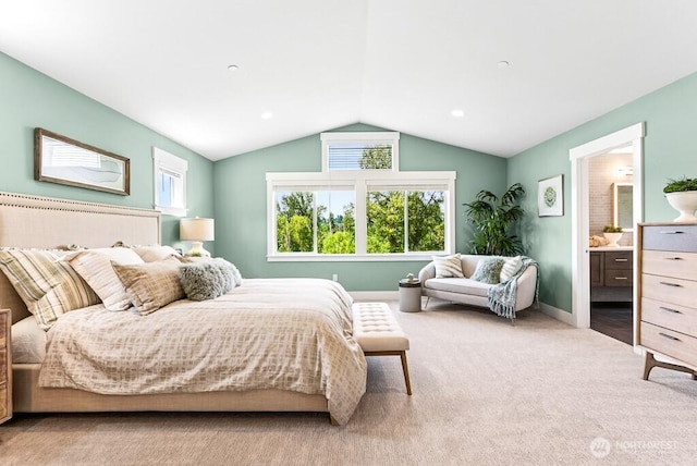 19507 81st Pl NE Unit 3, Kenmore, WA 98028 - carpeted bedroom featuring multiple windows, lofted ceiling, and connected bathroom