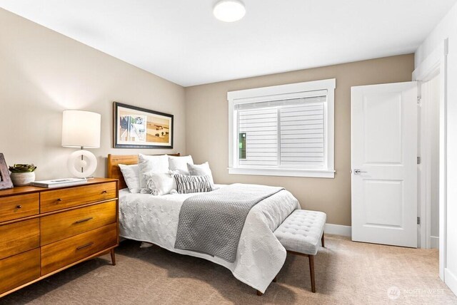 19507 81st Pl NE Unit 3, Kenmore, WA 98028 - bedroom featuring light carpet and baseboards