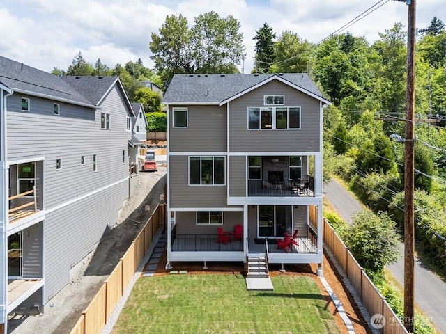19507 81st Pl NE Unit 3, Kenmore, WA 98028 - back of house featuring a fenced backyard and a balcony