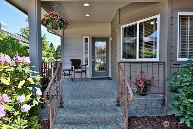 doorway to property with covered porch