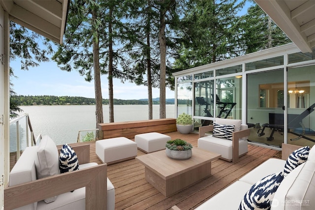 3236 Gravelly Beach Loop NW, Olympia, WA 98502 - deck with a water view, a sunroom, and an outdoor living space