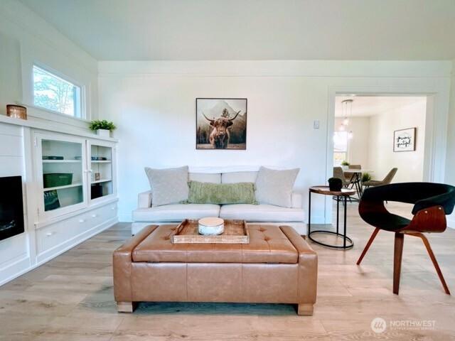 living room featuring light wood-style floors