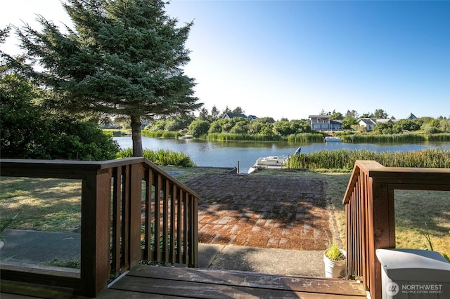 348 Cockle St SW, Ocean Shores, WA 98569 - wooden deck with a water view and a dock