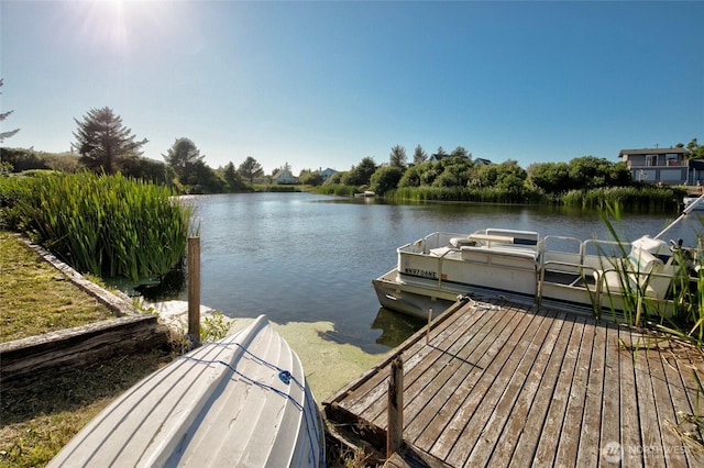 348 Cockle St SW, Ocean Shores, WA 98569 - view of dock with a water view