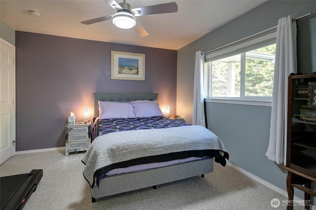 348 Cockle St SW, Ocean Shores, WA 98569 - carpeted bedroom with baseboards and ceiling fan